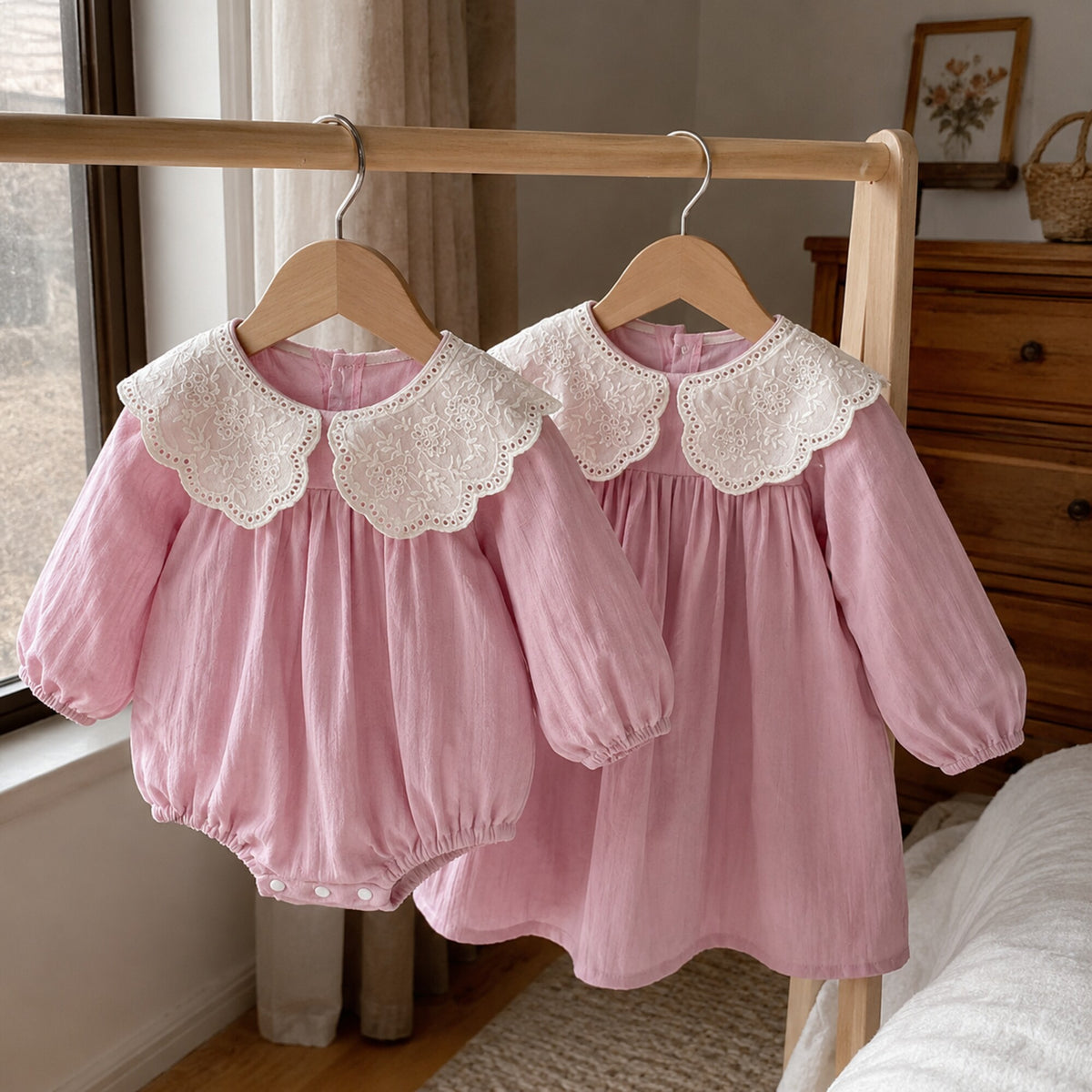 Dusty rose lace collar baby romper and girls dress hanging naturally