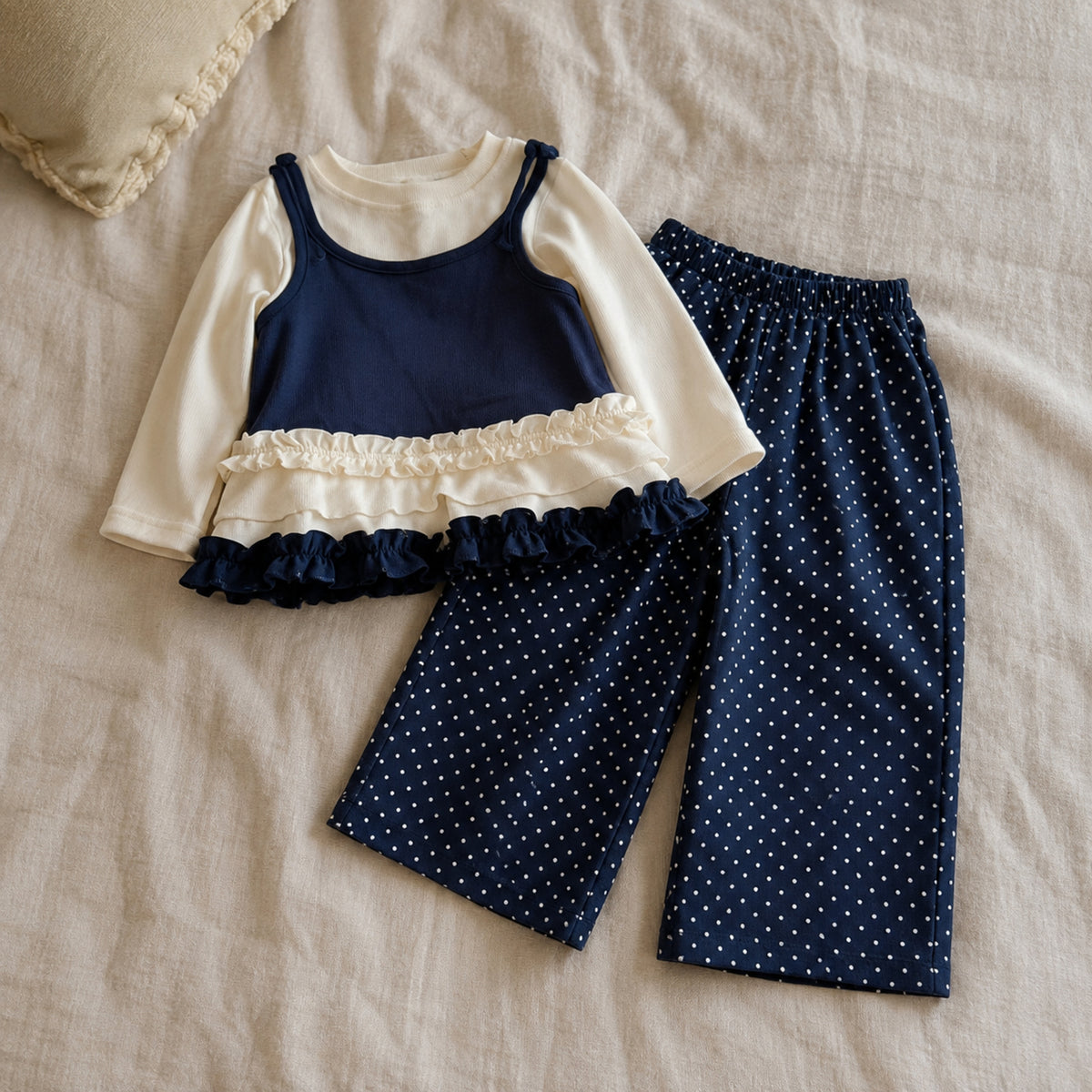 Complete cream and navy ruffle top with polka dot wide-leg pants girls outfit