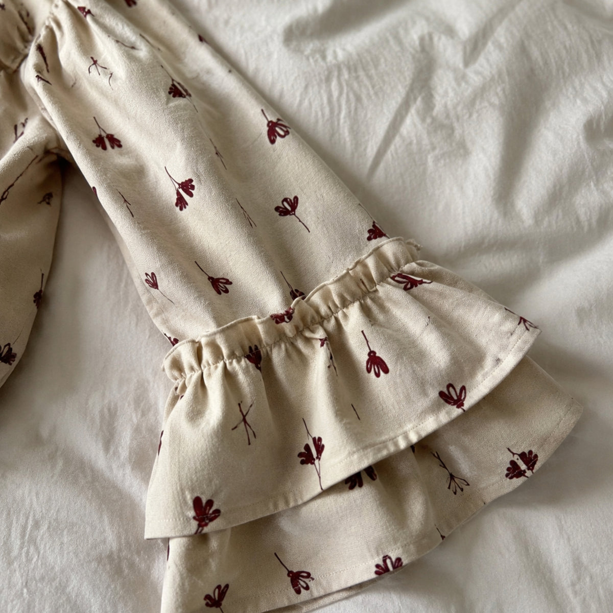 Close-up of the long puff sleeve and ruffled cuff