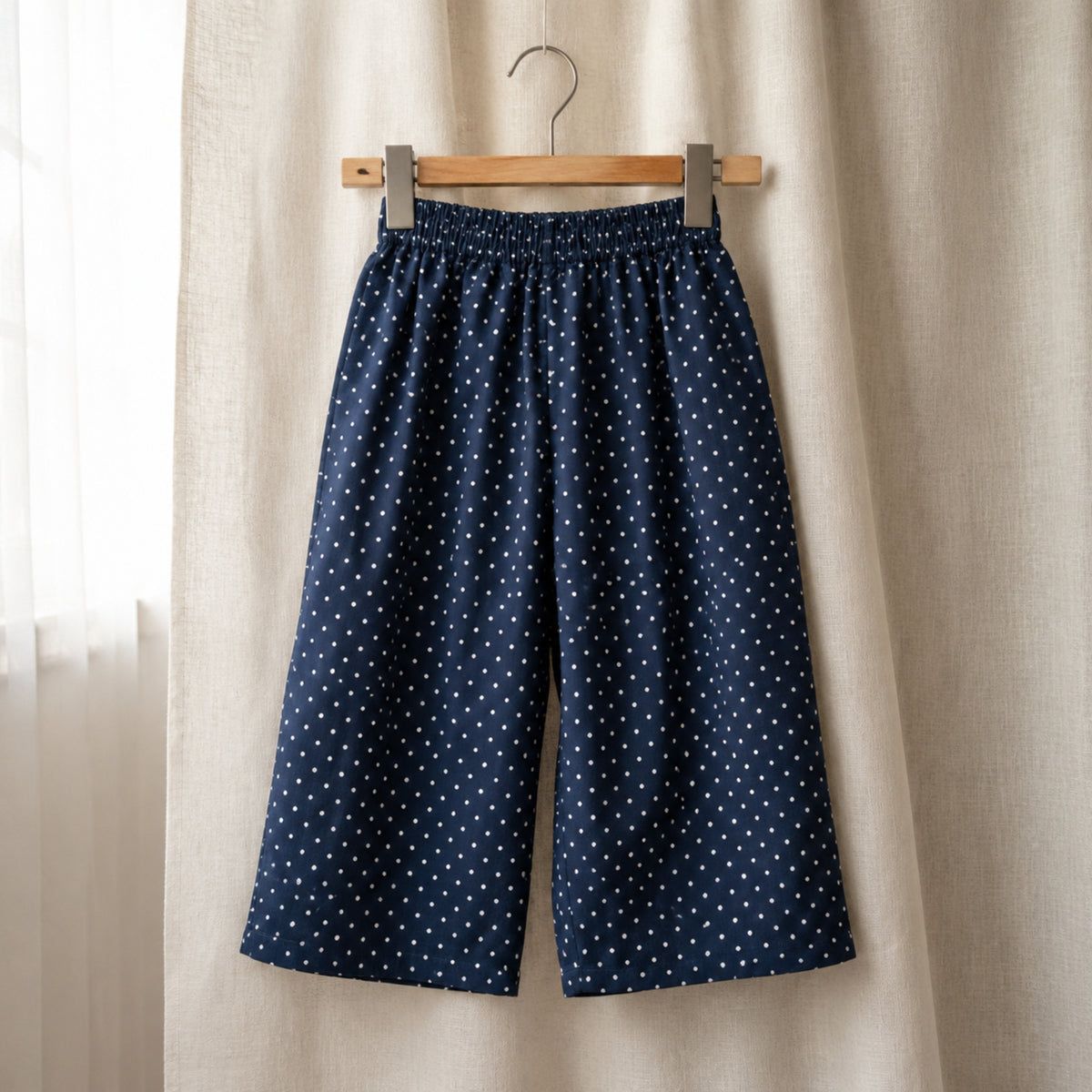 Navy tiny polka dot wide-leg elastic-waist pants shown as a separate option