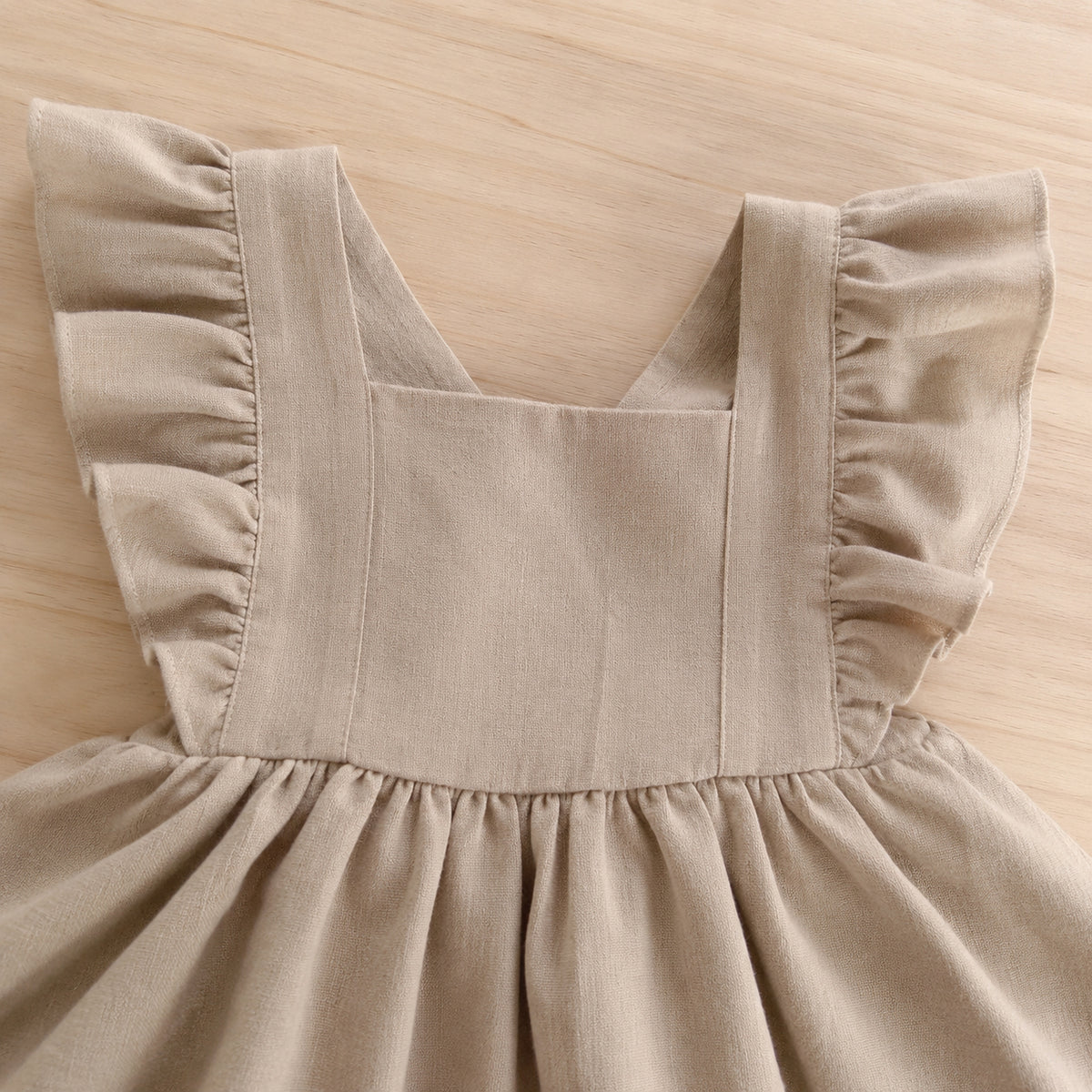 Khaki pinafore square bib and gathered waist