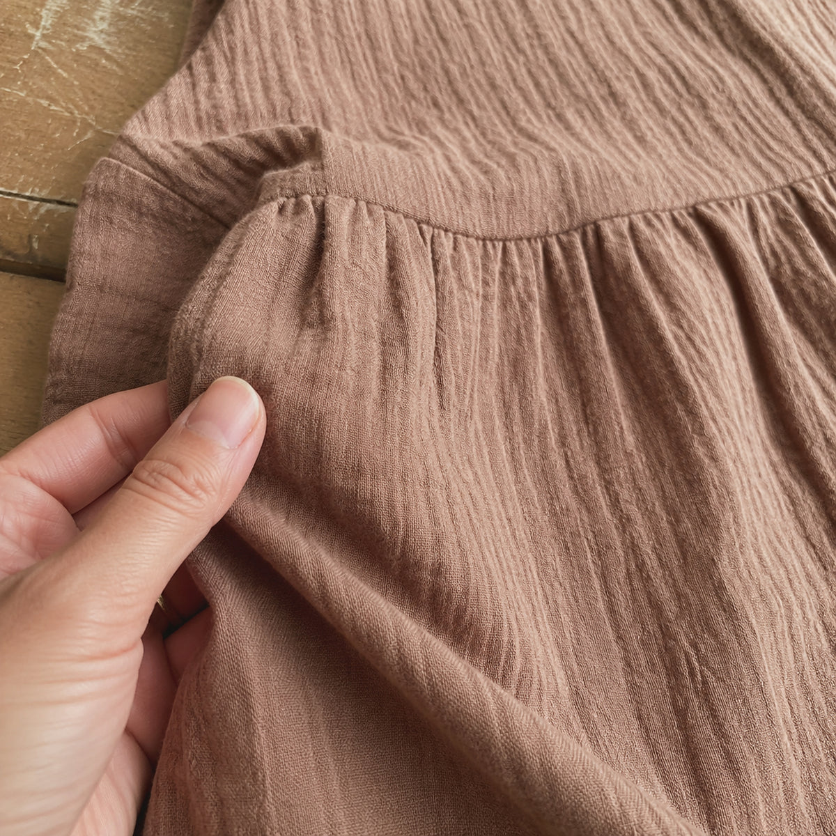 Brown cotton linen crinkle fabric close up