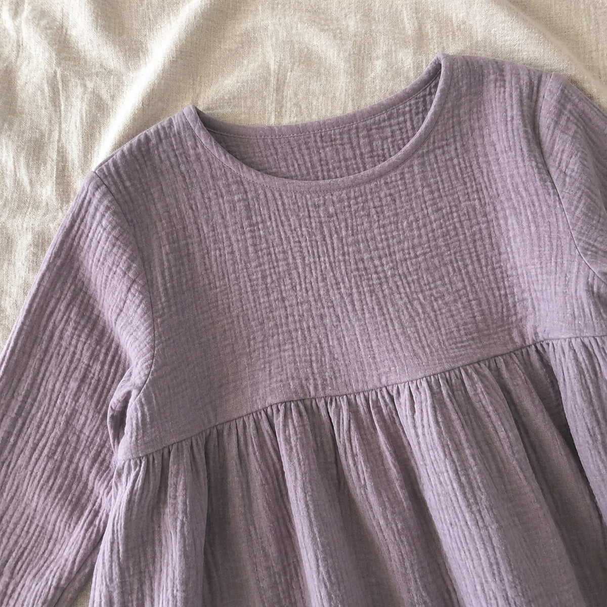 Lavender girls dress neckline and gathered waist detail