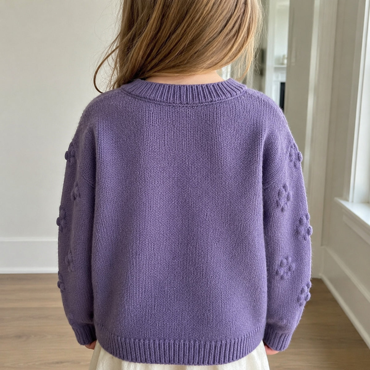 Plain back view of girls dusty purple knit cardigan