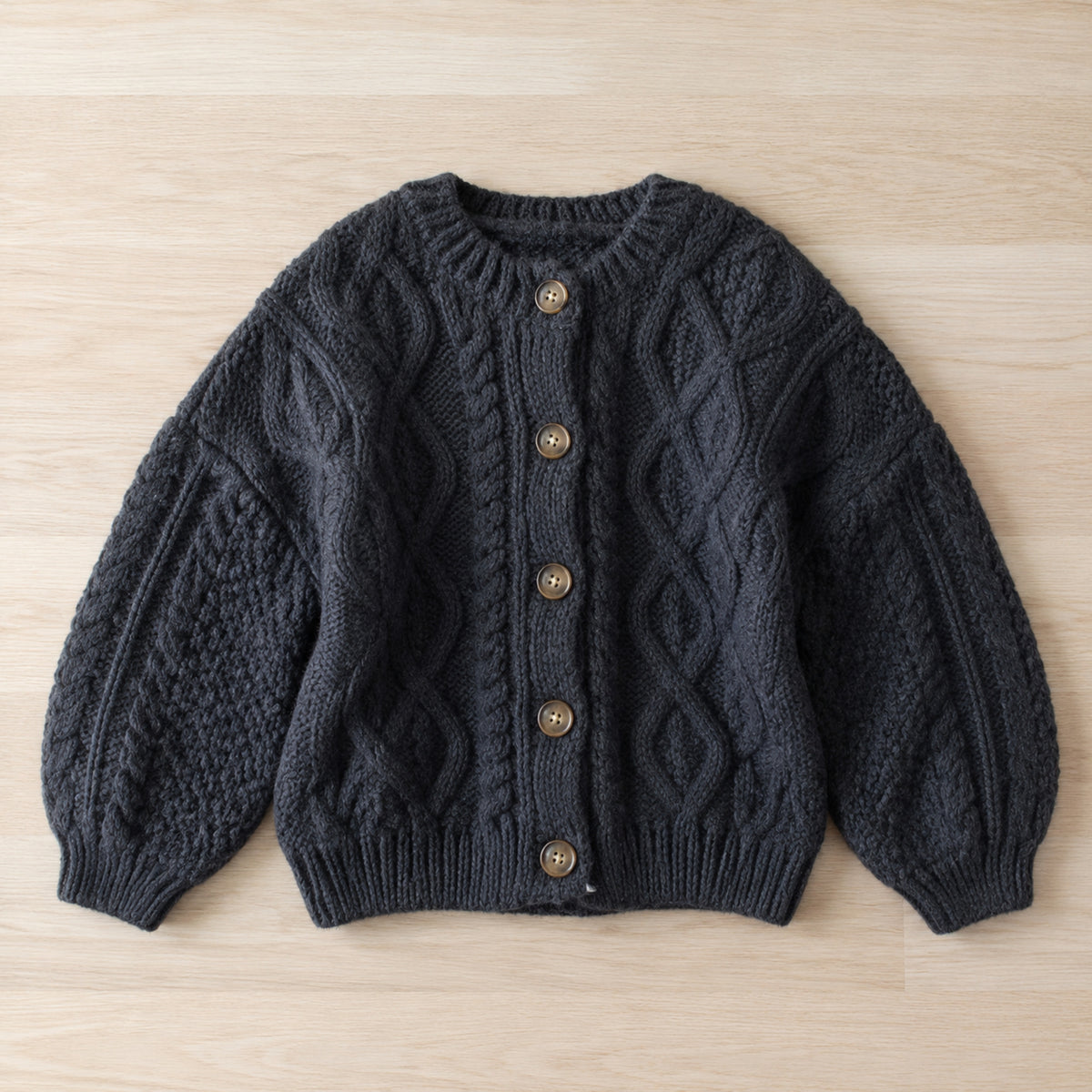 Charcoal grey cable-knit cardigan front view