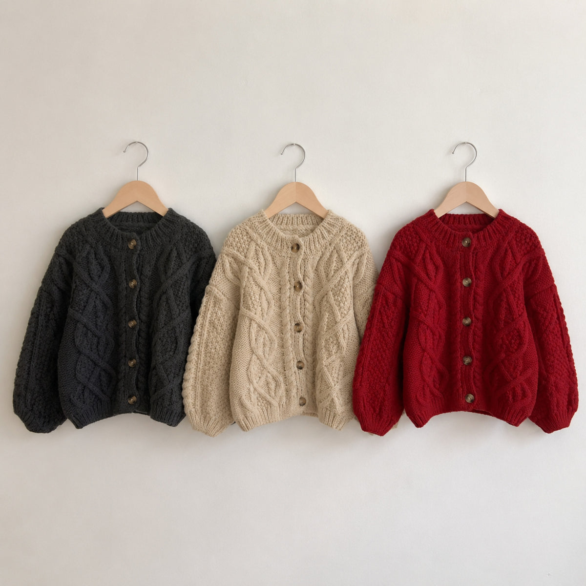 Grey cream and red cable-knit cardigan colors