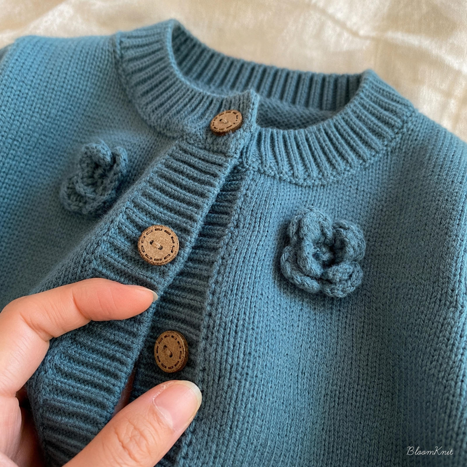 Teal cardigan buttons and neckline