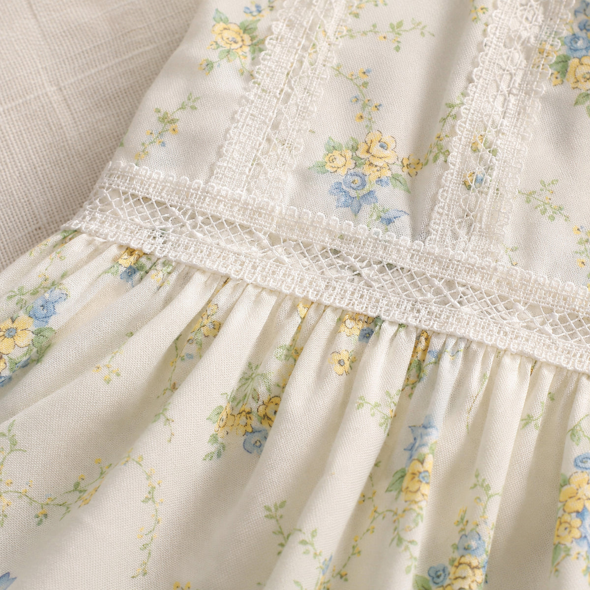 White openwork lace waistband and floral cotton detail