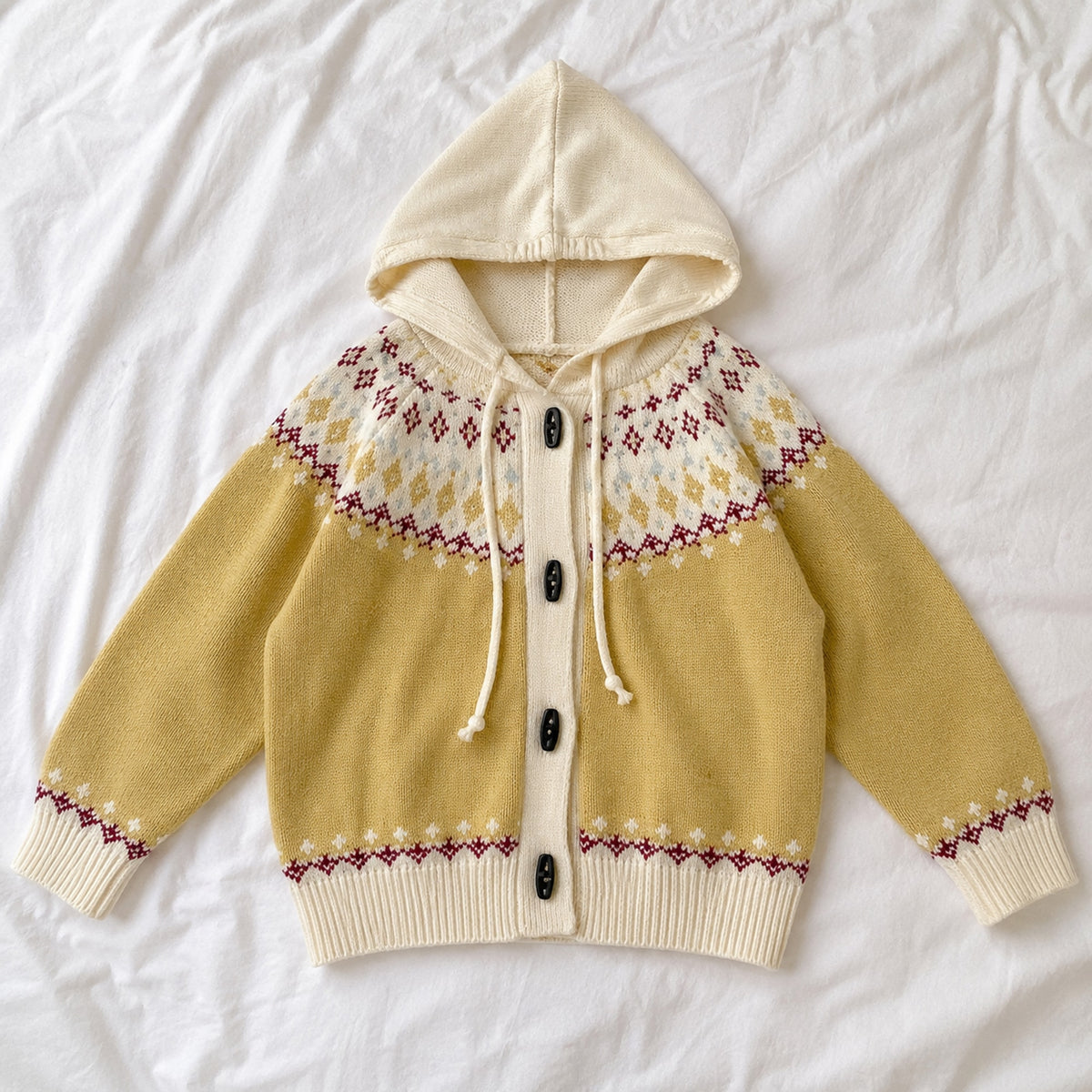 Muted yellow girls jacquard hooded cardigan, full front flat lay