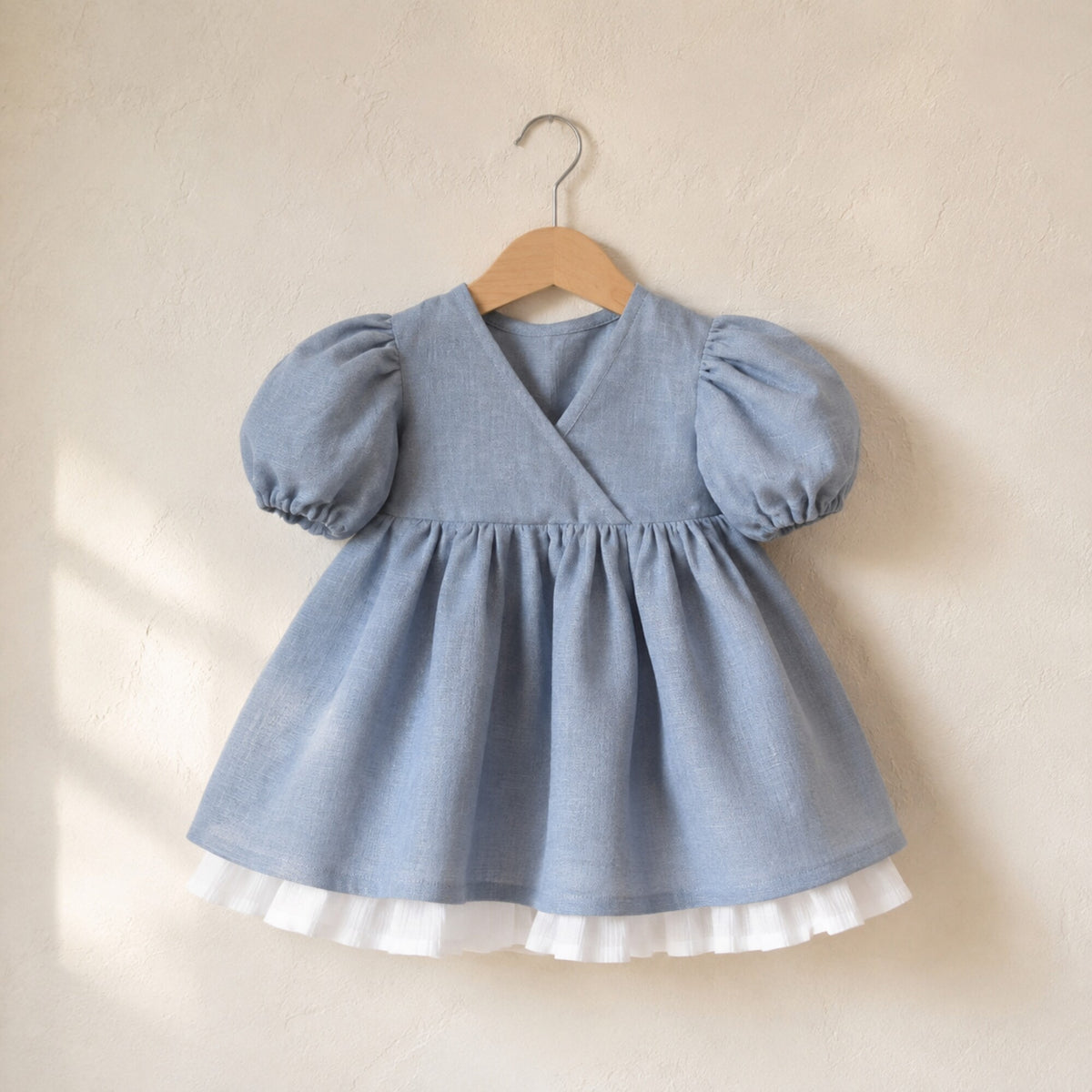 Dusty blue linen puff sleeve girls dress with white ruffle hem
