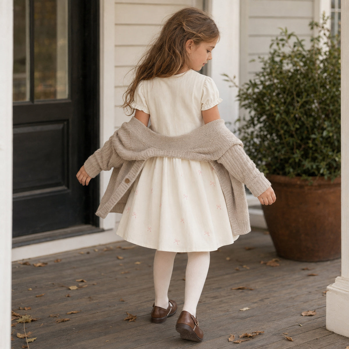 Girls bunny bow cotton dress — ivory dress natural rear view