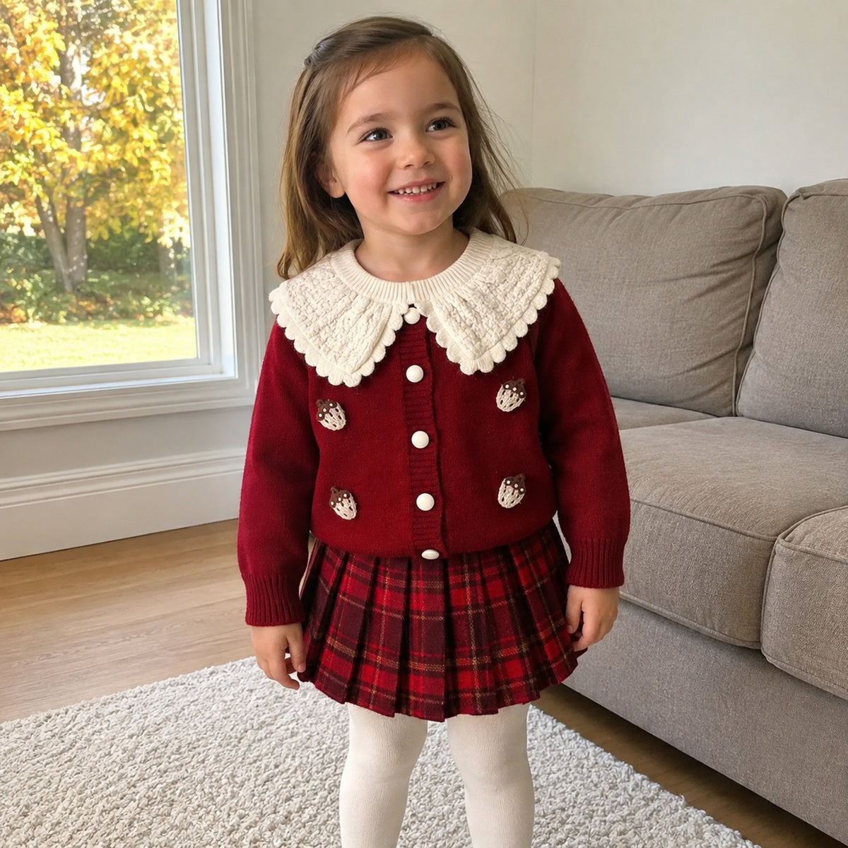 Girls burgundy strawberry knit cardigan and red plaid skirt set