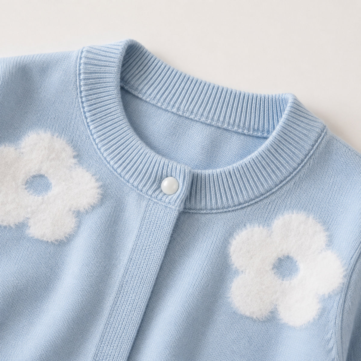 Girls' light blue floral cardigan round neckline detail