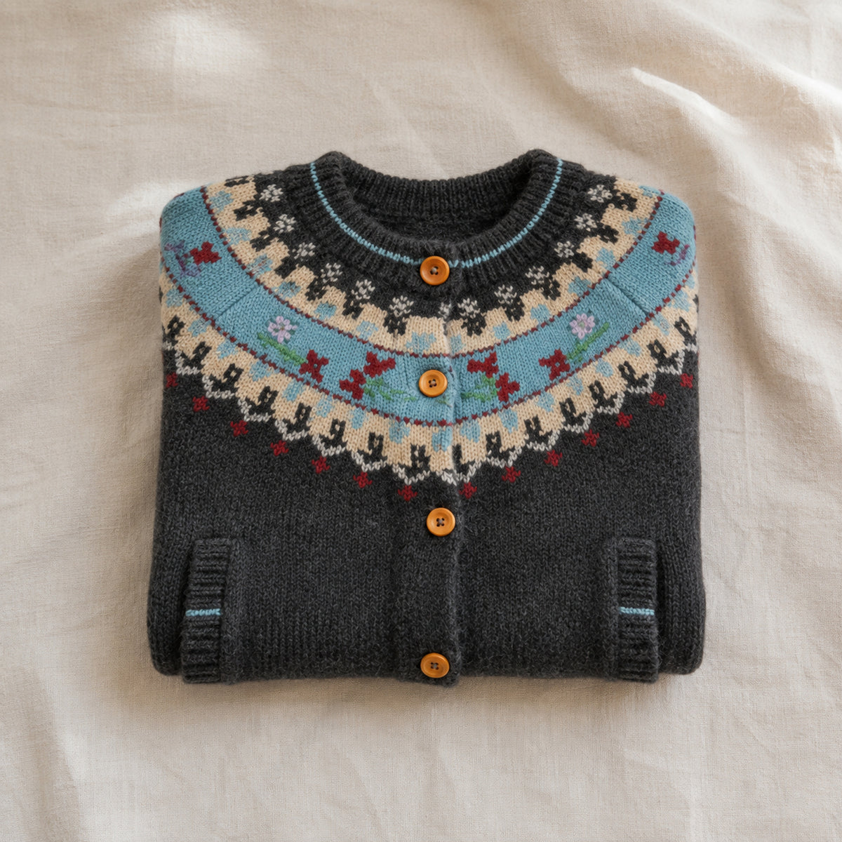 Girls' retro Fair Isle cardigan neatly folded