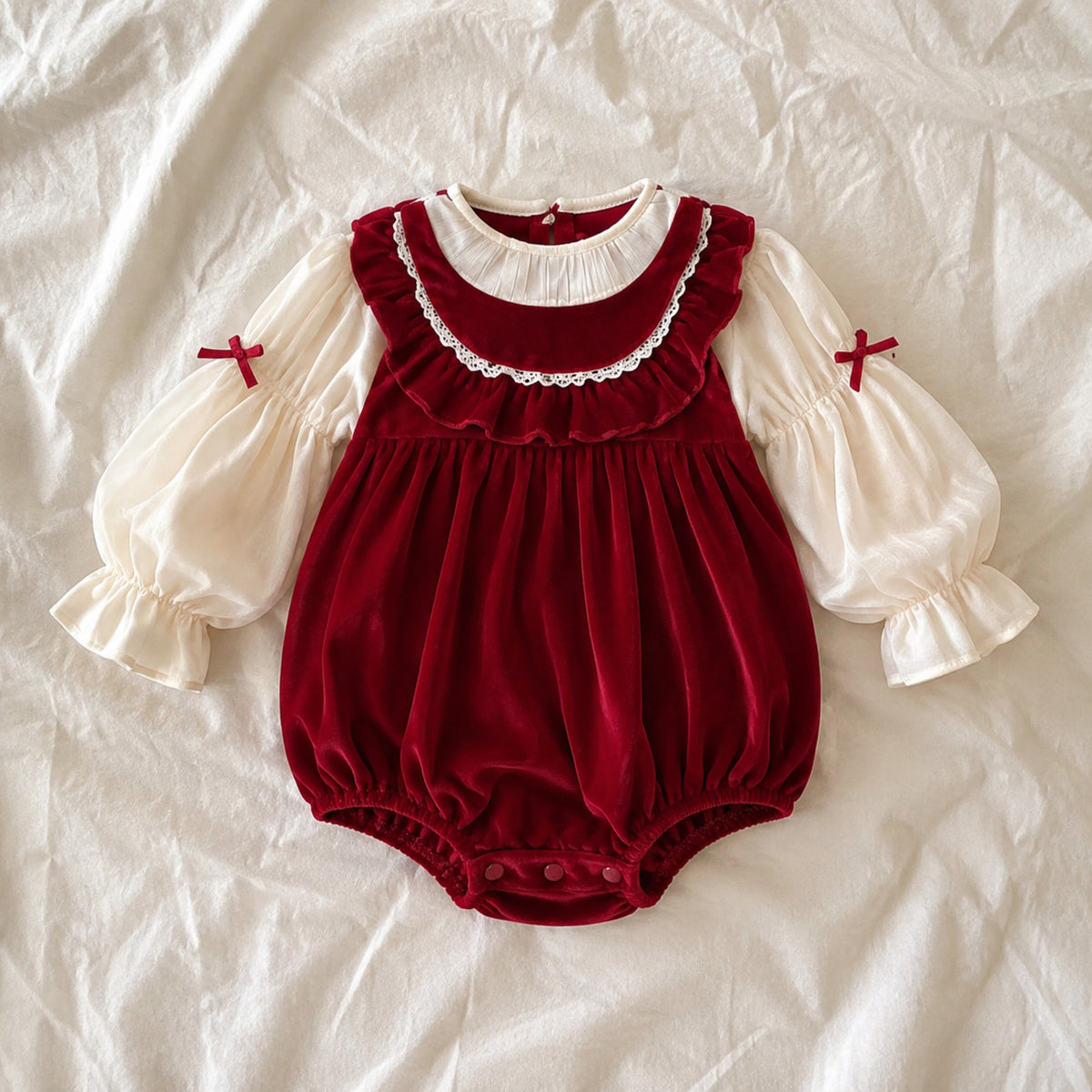 Deep crimson bubble romper with ivory puff sleeves