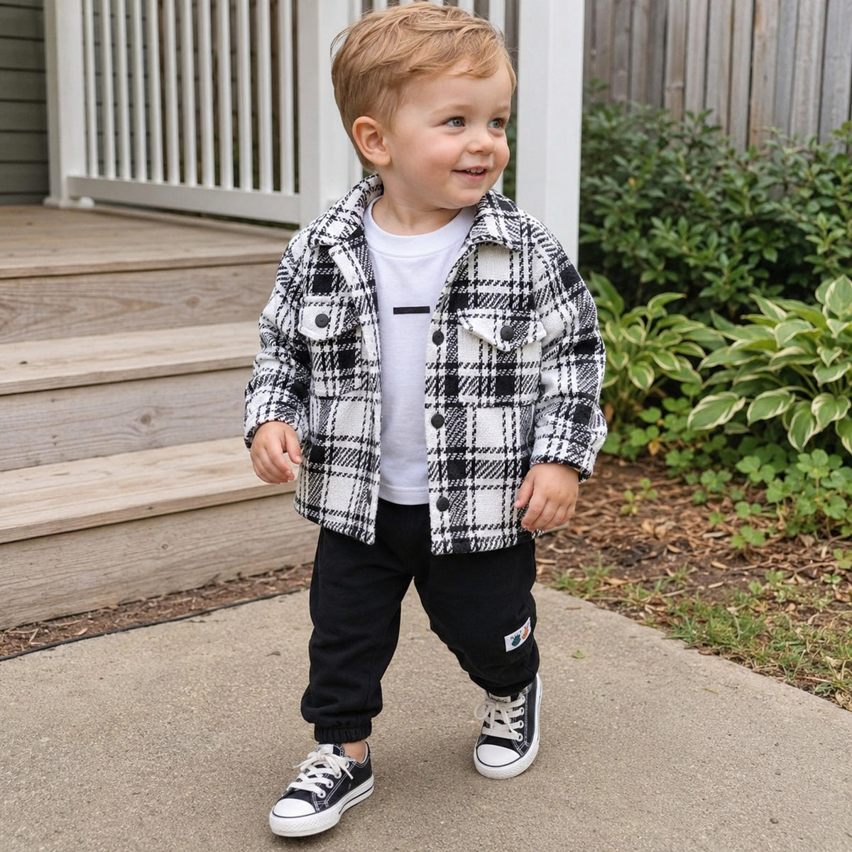 Boys white plaid shacket outfit worn outdoors
