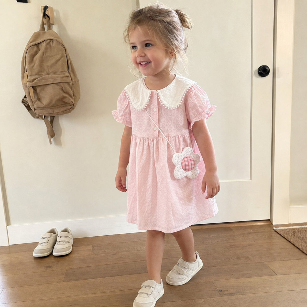 Pink collar dress for a preschool morning