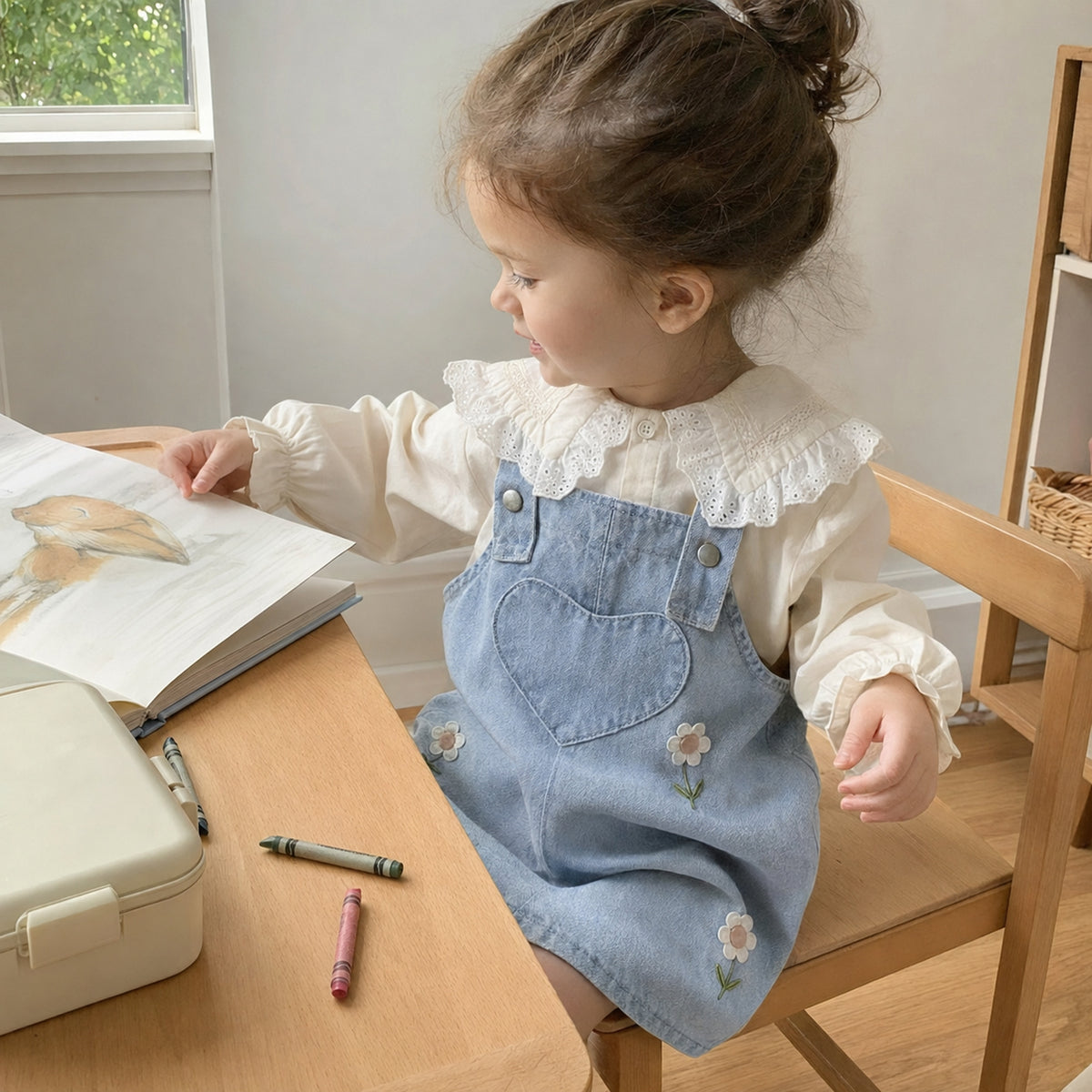 Girls denim preschool outfit at a simple home activity desk