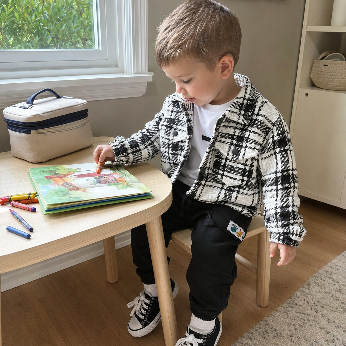 Boys plaid school outfit at a casual activity desk