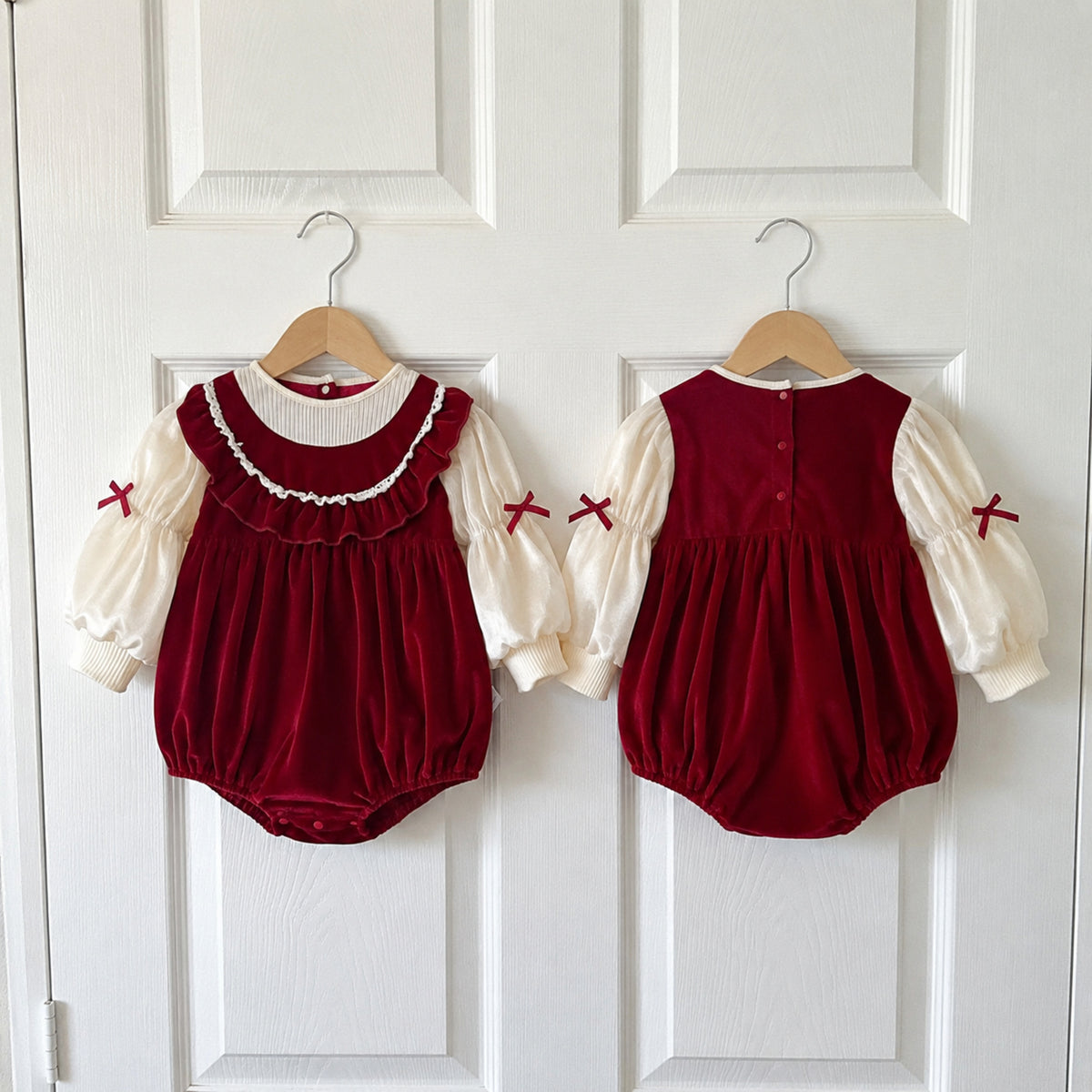 Red bubble romper front and back views on hangers