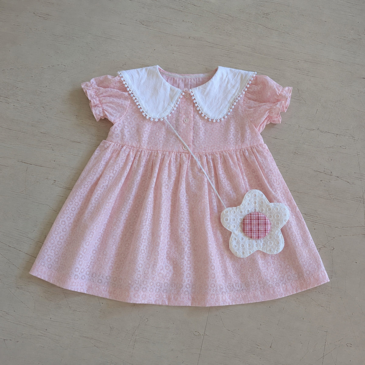 Pink puff sleeve Peter Pan collar dress flat lay
