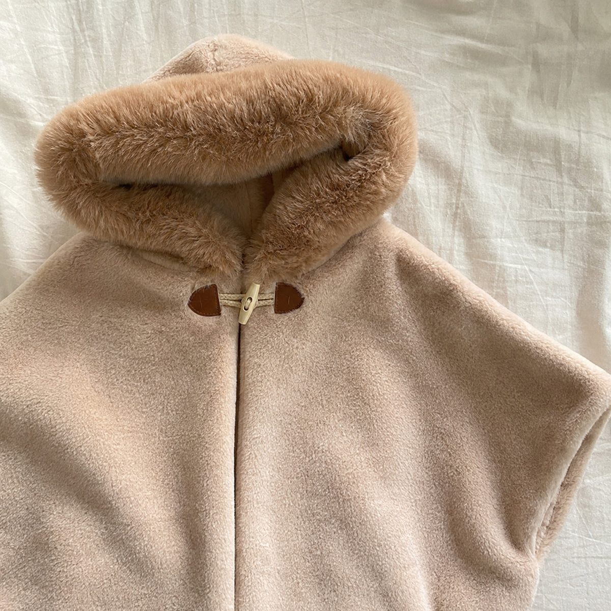 Khaki cape faux fur hood and toggle detail
