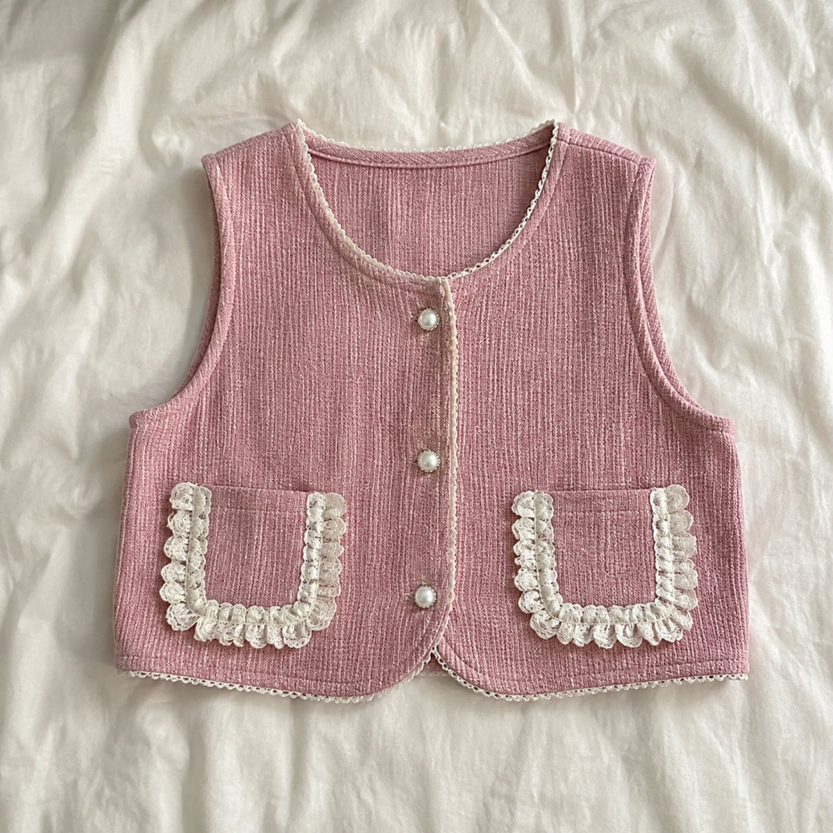Pearl button vest lace pocket and trim detail