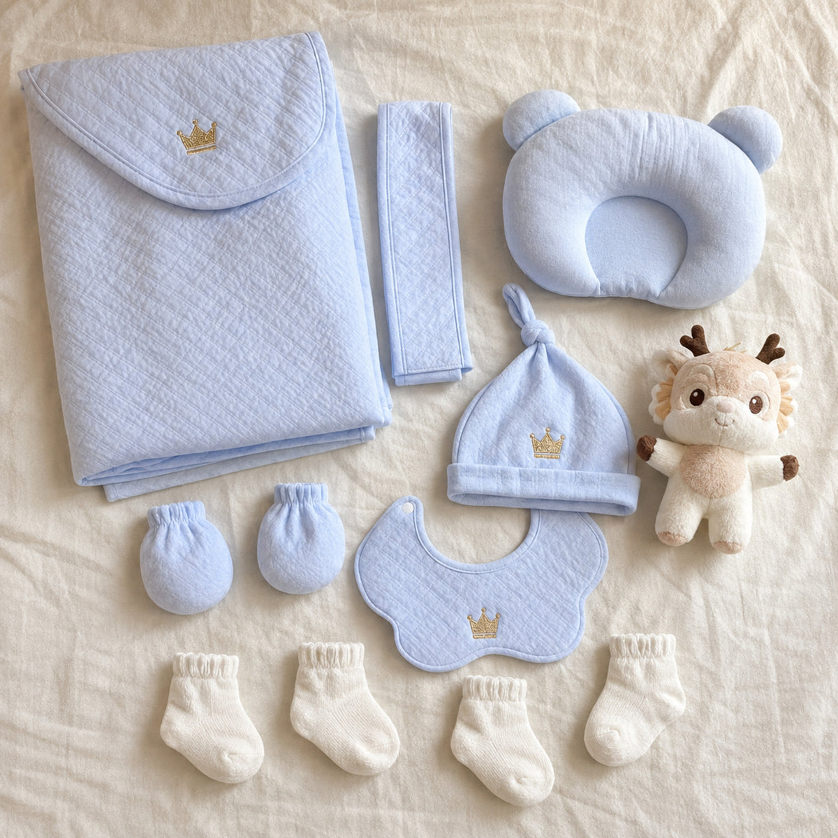 Newborn hat bib mittens socks pillow and comfort doll