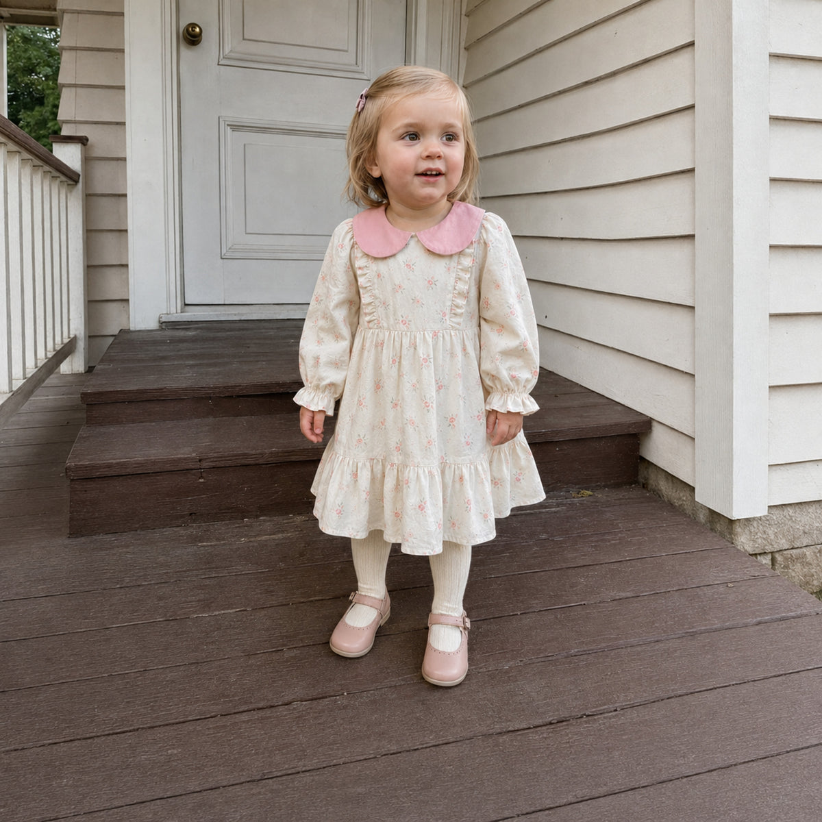 Girls Ivory Floral Dress with Pink Peter Pan Collar — natural lifestyle front view