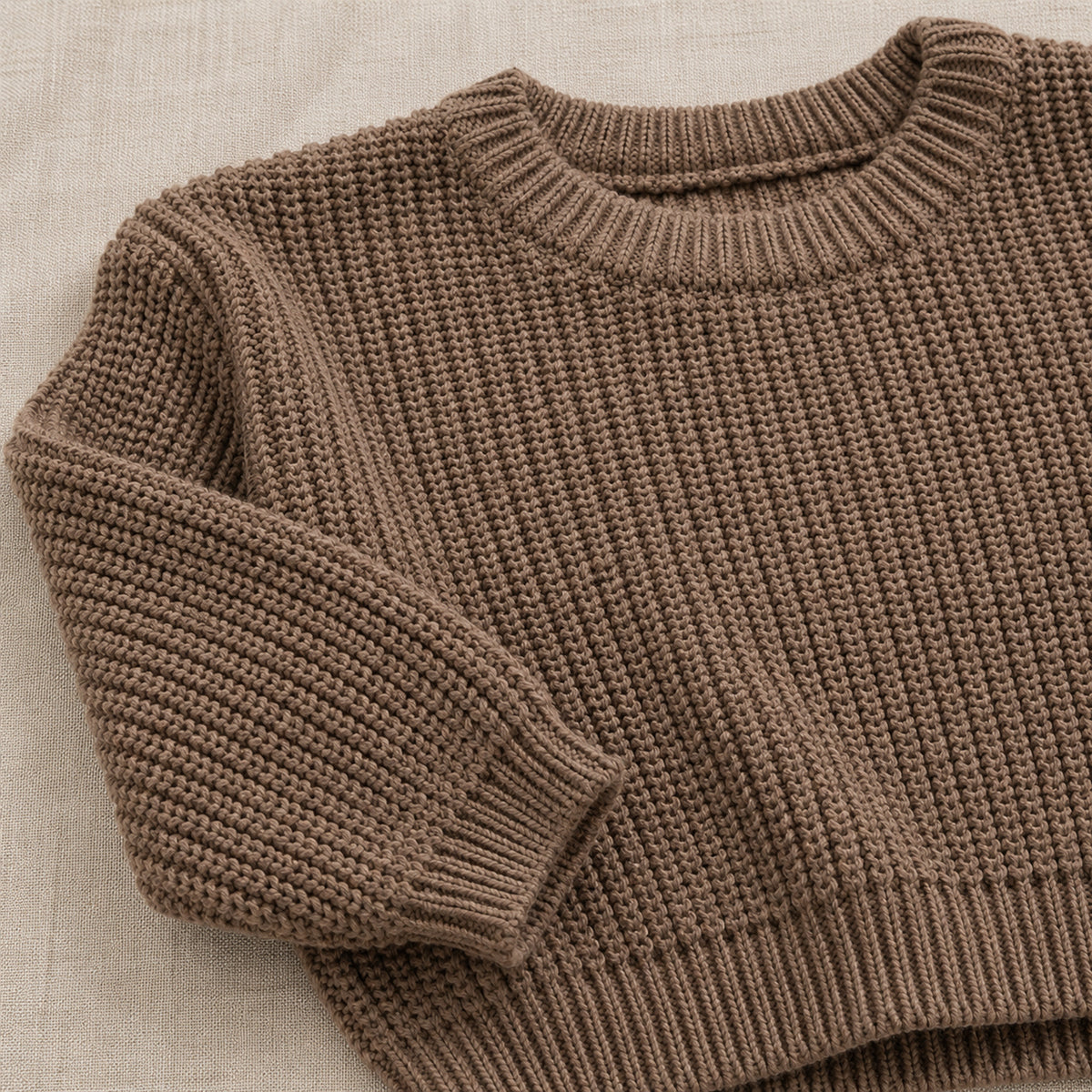 Kids' deep beige chunky knit pullover neckline and cuff detail